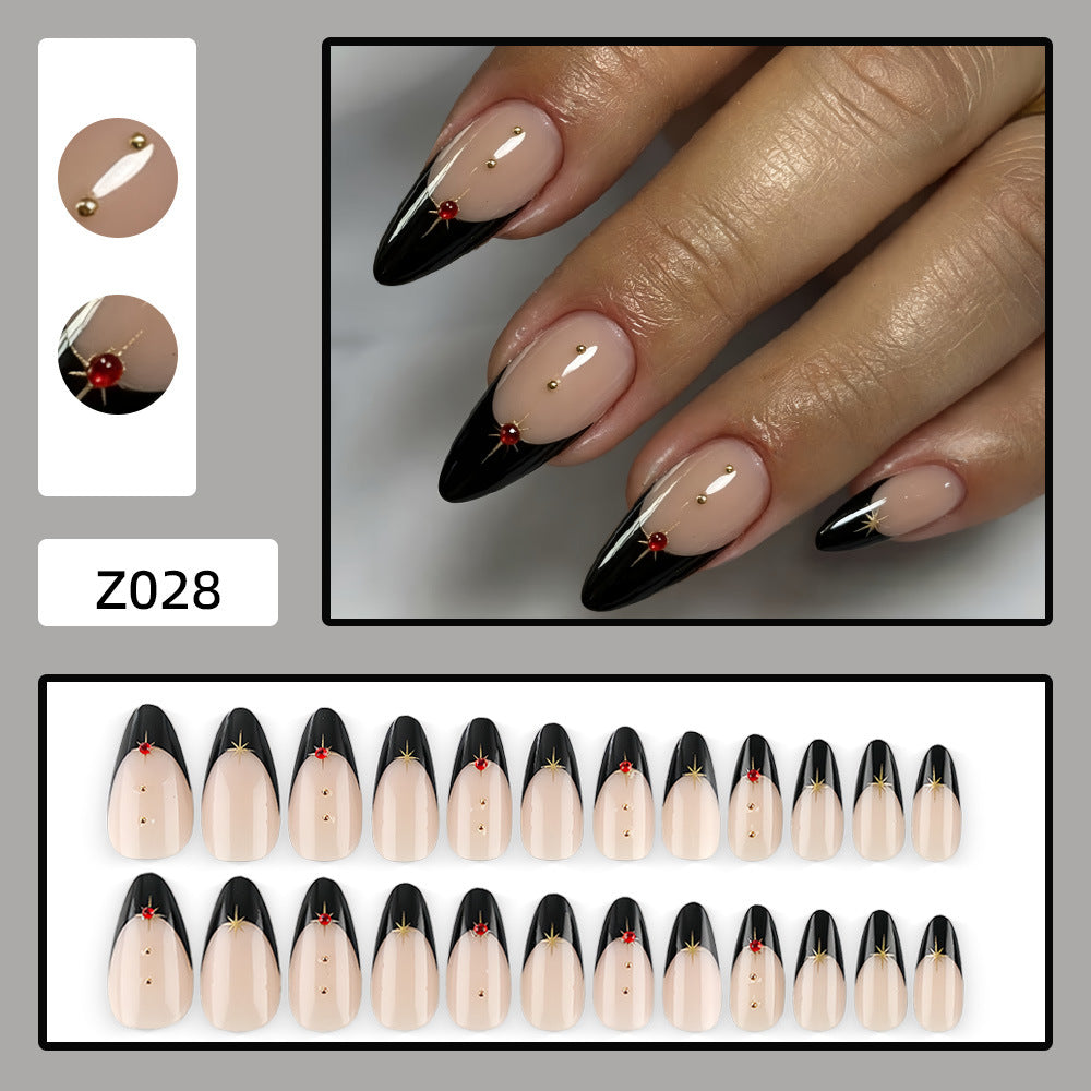 Glamorous artificial nails in stylish stiletto design with golden accents Bowlift