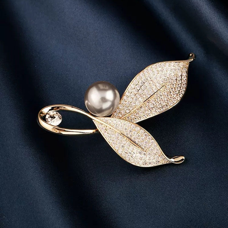 Elegant and Glamorous Brooch with Pearls and Crystals Bowlift