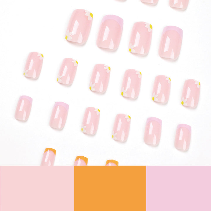 Artistic acrylic nails with floral design and creative color accents Bowlift
