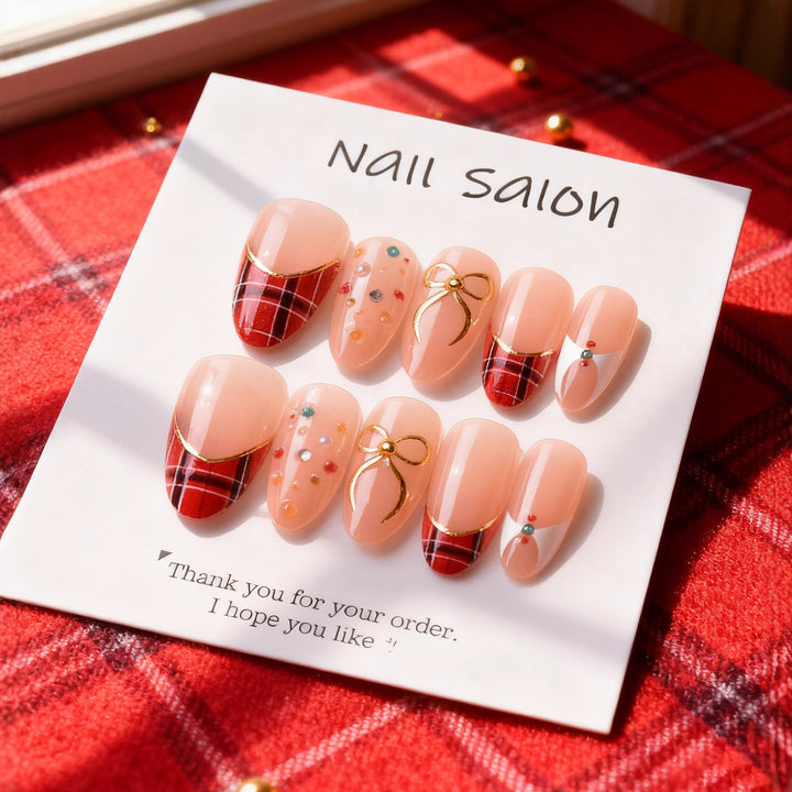 Artificial nail set with festive design and sparkling accents Bowlift