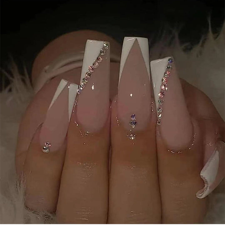 Glamorous Stiletto Nail Extensions with Rhinestone Accents Bowlift
