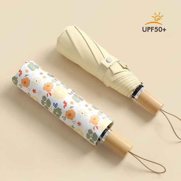 Ladies elegant and colorful folding umbrella with floral design Bowlift