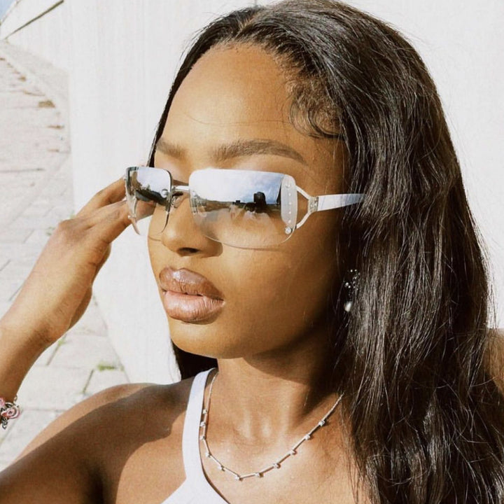 Ladies extravagant sunglasses in modern design with fine accents Bowlift