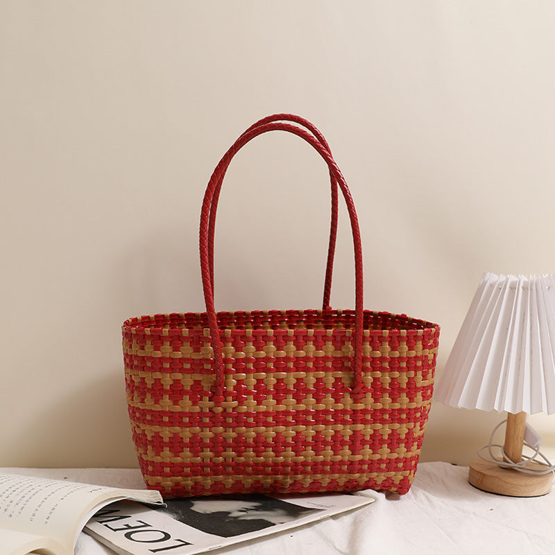 Braided straw bag with color-contrasting stripes Bowlift