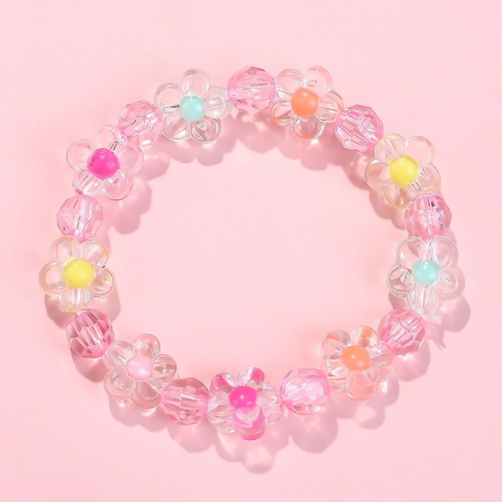 Friendship bracelet with colorful flower motifs Bowlift