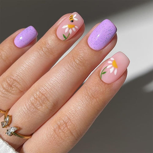 Artfully designed nail extensions with flower design Bowlift