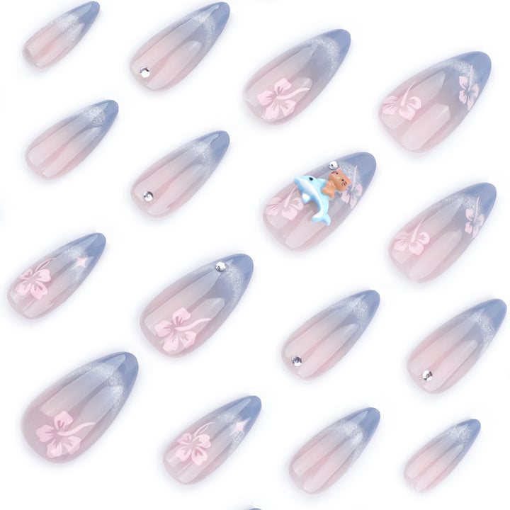 Artful nail extensions with elegant ombré design and floral accents Bowlift