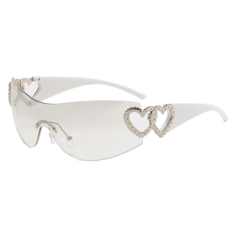 Ladies sporty sunglasses in trendy shield design with heart accents Bowlift