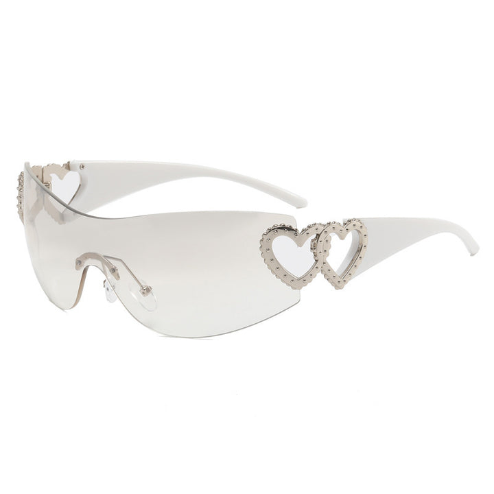 Ladies sporty sunglasses in trendy shield design with heart accents Bowlift