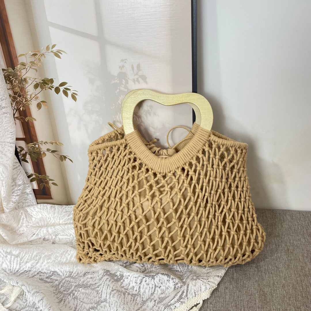 Stylish handbag with heart-shaped handle Bowlift