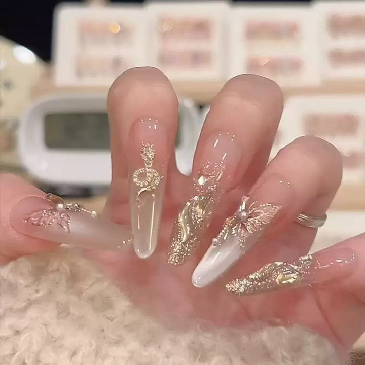 Artificial nail set with elegant tips and crystal accents Bowlift