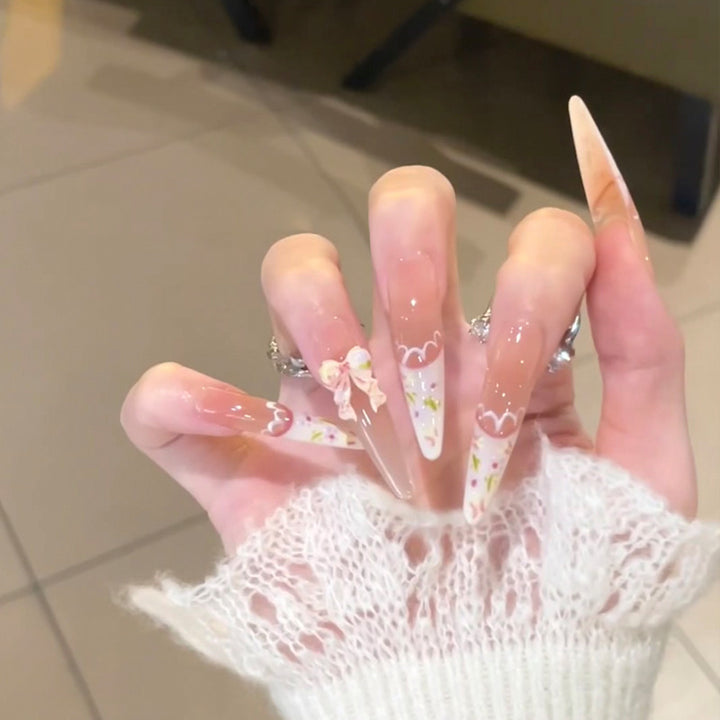 Artistic Nail Design with Decorative Elements Bowlift