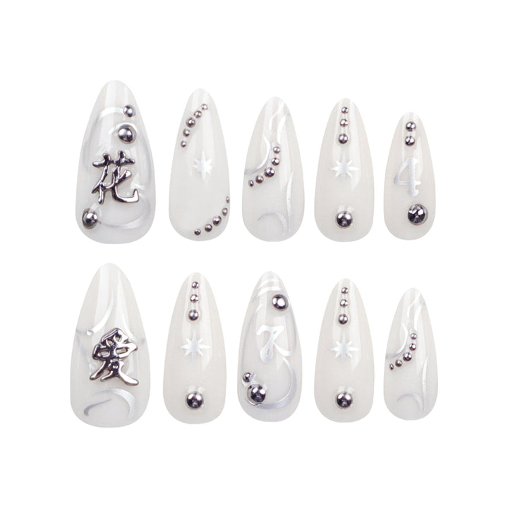 Artistic acrylic nails with elegant glitter patterns Bowlift