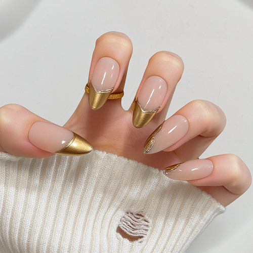 Artificial nails in elegant stiletto design with gold accents Bowlift