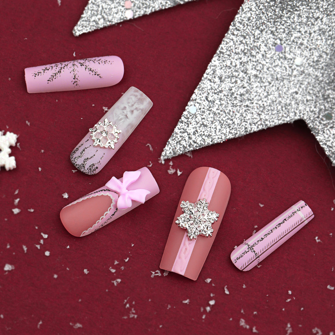 Artful nail extensions with festive decorations Bowlift