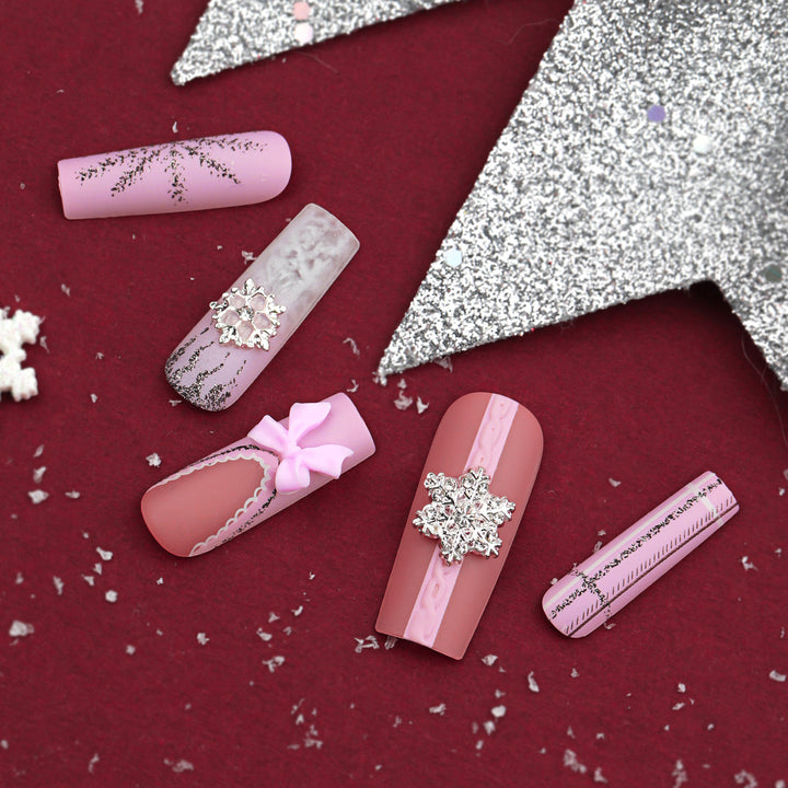 Artful nail extensions with festive decorations Bowlift