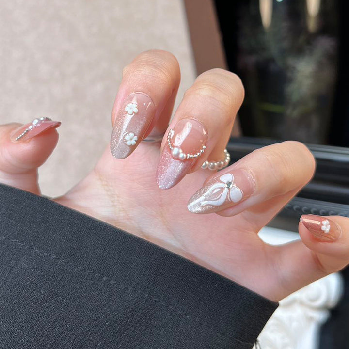 Glossy Nail Art Set with Sparkling Glitter Accents Bowlift