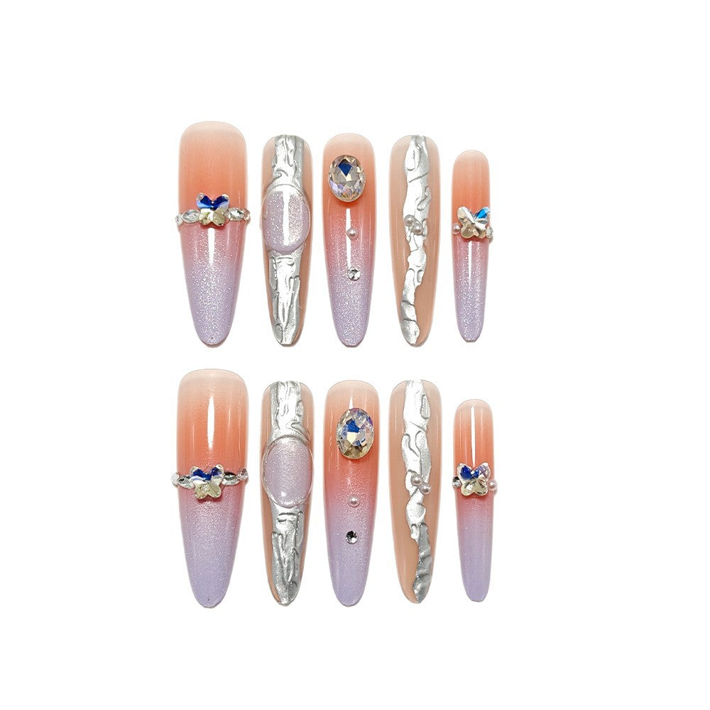 Artificial nails with elegant ombre design and jewelry accents Bowlift