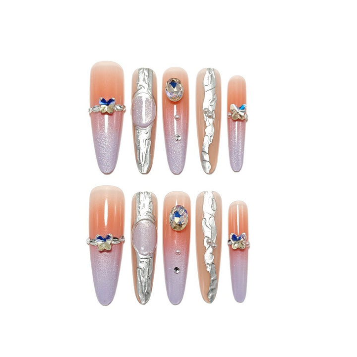 Artificial nails with elegant ombre design and jewelry accents Bowlift