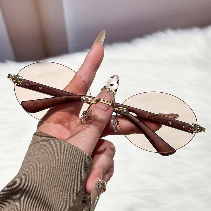 Ladies fashionable and elegant sunglasses with oval design Bowlift