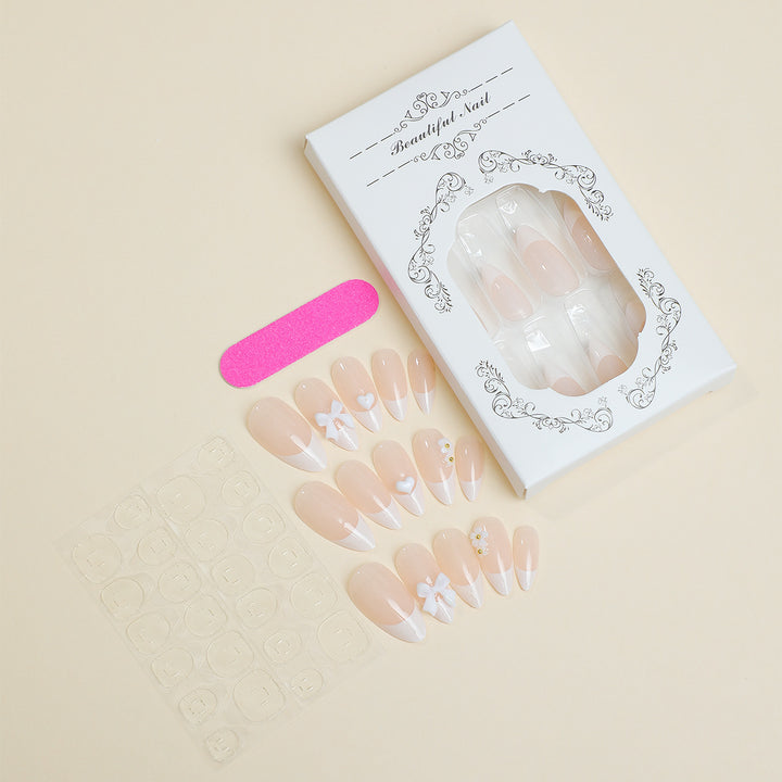 Artificial nail set with decorative French tip design Bowlift