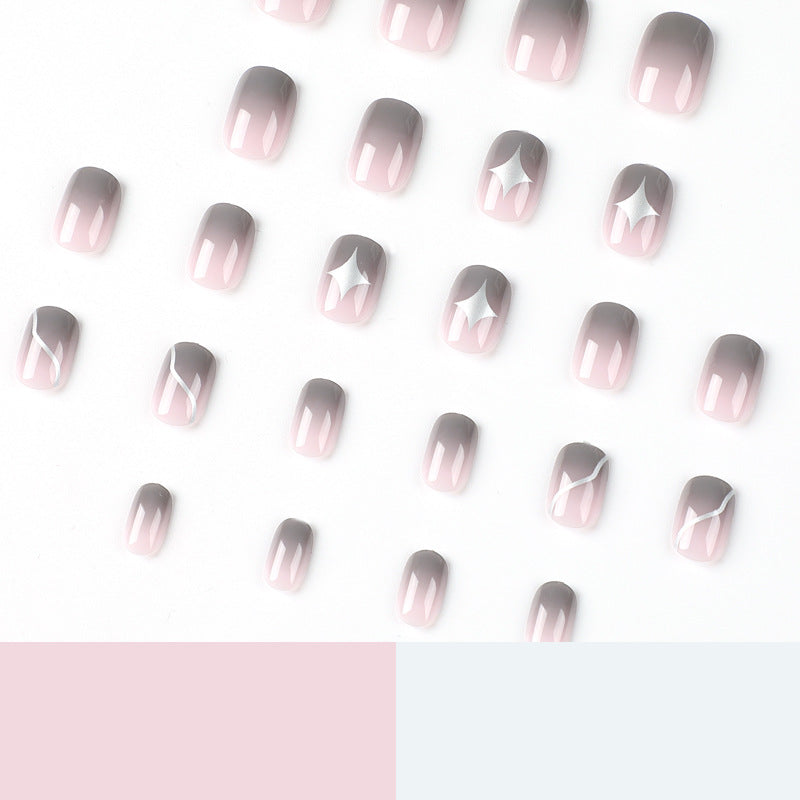Artificial nail art with elegant ombre design and charming accents Bowlift