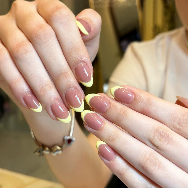 French Tip Press-On Nail Set with Decorative Yellow Accents Bowlift