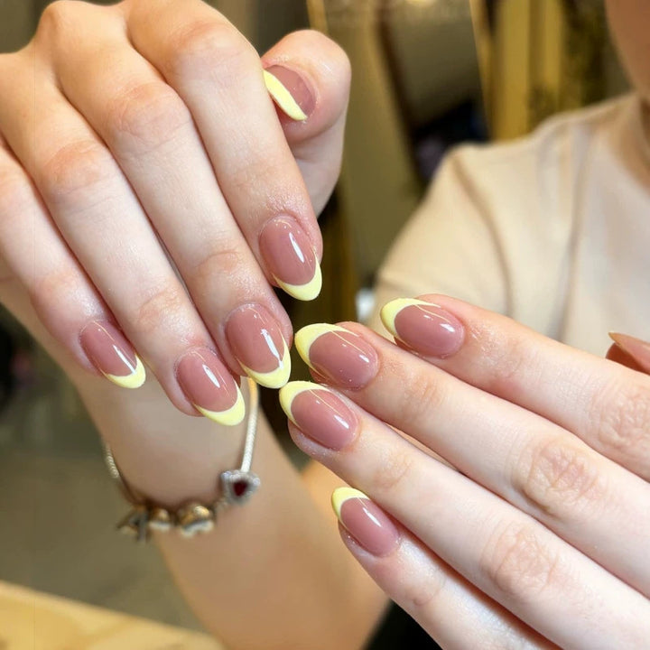 French Tip Press-On Nail Set with Decorative Yellow Accents Bowlift