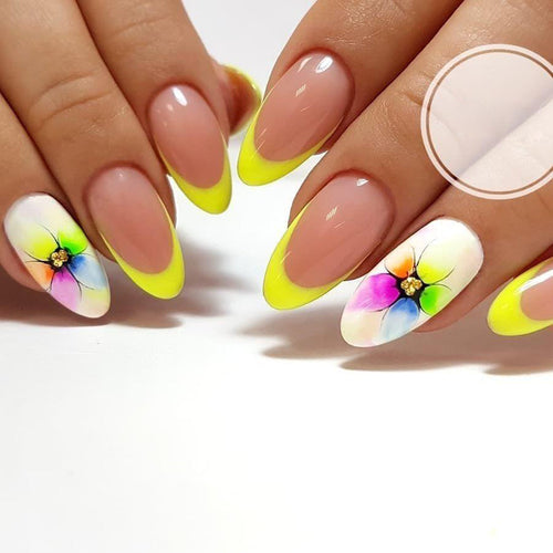 Stylish artificial nails with floral accents and colorful French tip design Bowlift