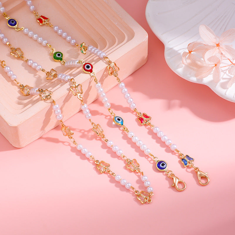 Decorative Pearl and Butterfly Eyewear Chain Bowlift