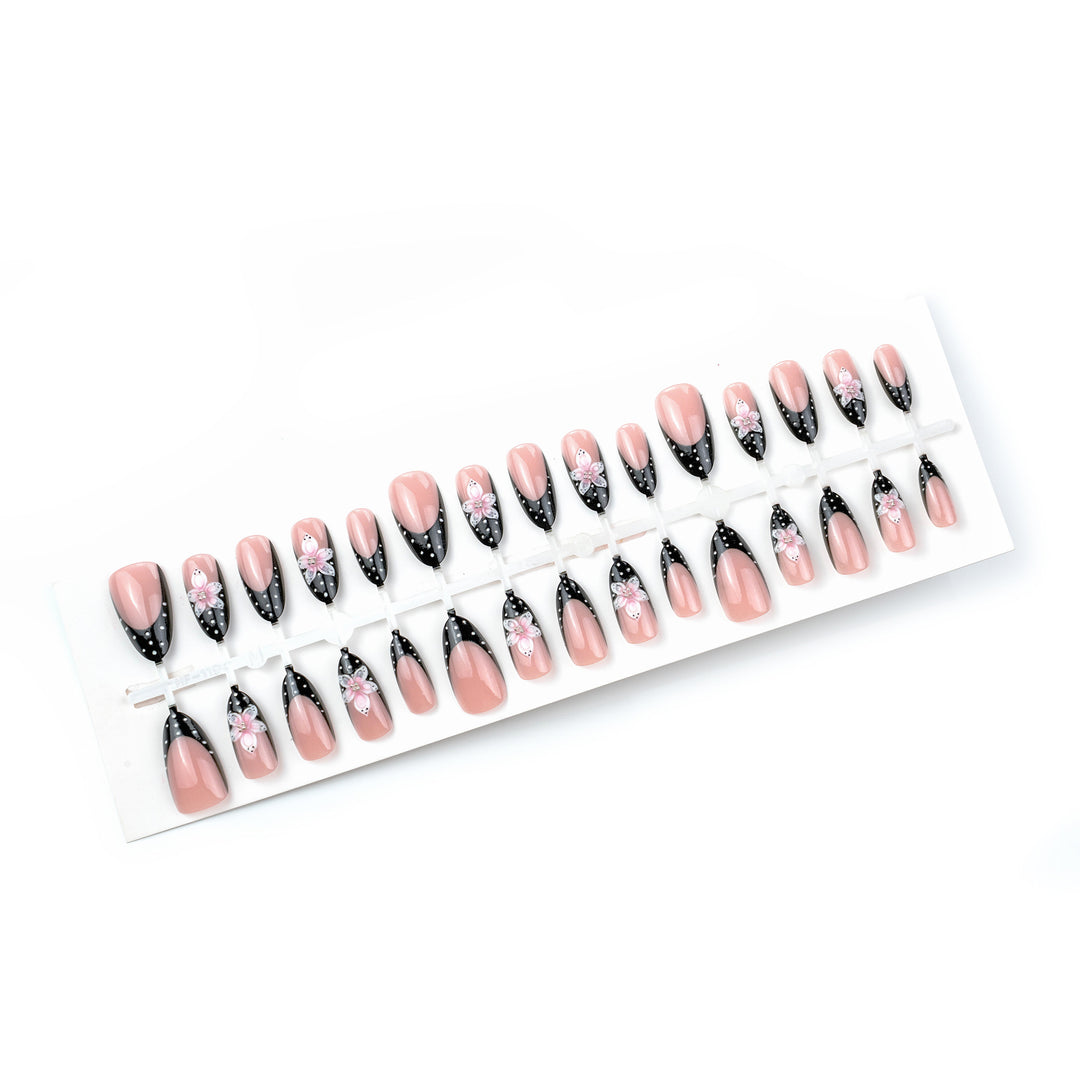Artistic Press-On Nail Set with Floral Accent Bowlift
