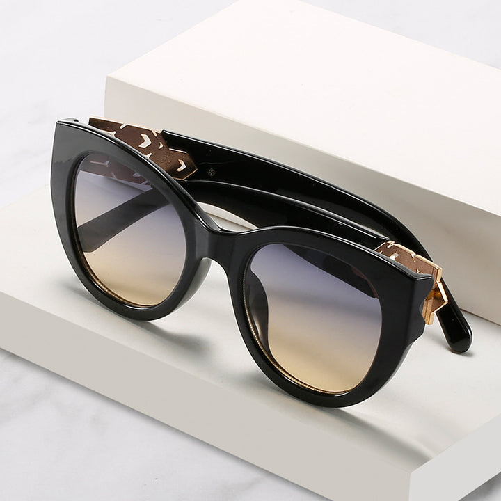 Fashion-Forward Cat-Eye Sunglasses with Decorative Accents Bowlift