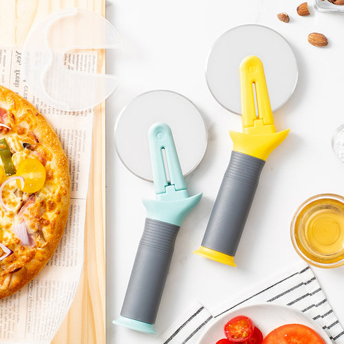 Ergonomic pizza cutter with safety mechanism Bowlift