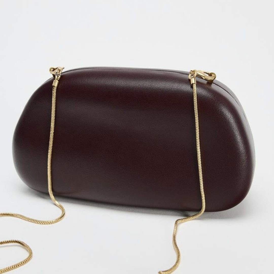 Statement Clutch with Sculptural Handle Bowlift