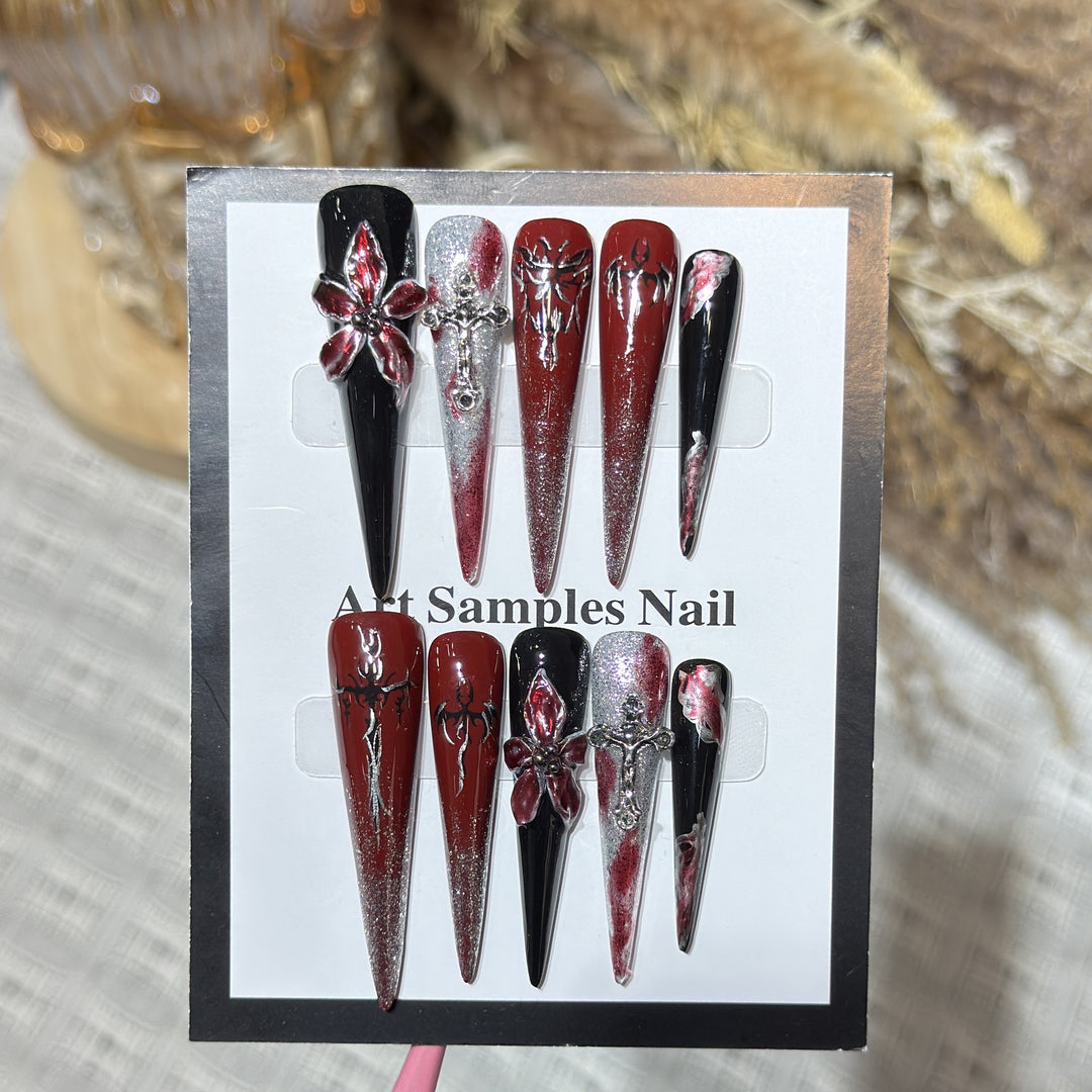 Artistic Stiletto Press-On Nail Set with Unique Gothic Design Elements Bowlift