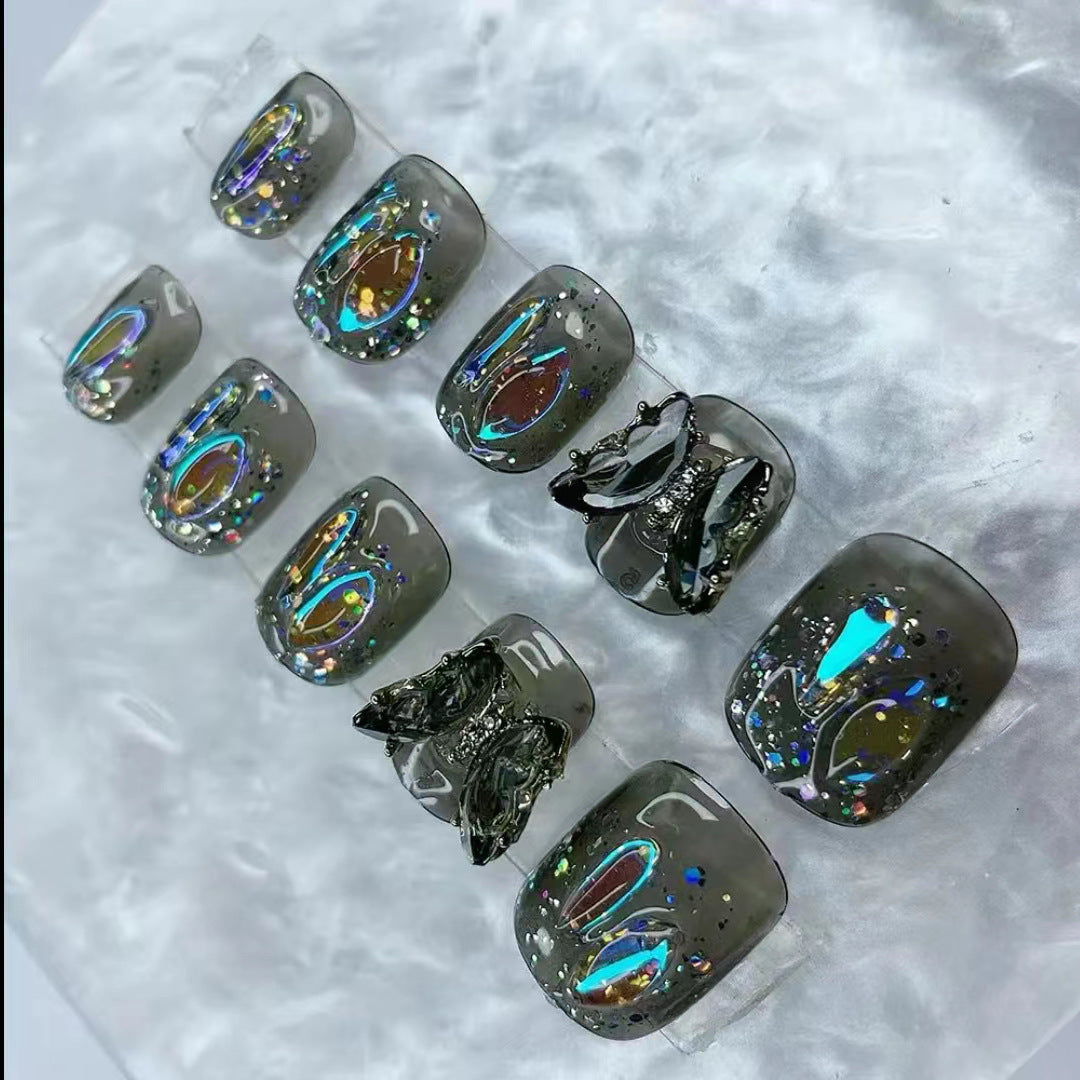 Elegant nail design with bow and rhinestone details Bowlift