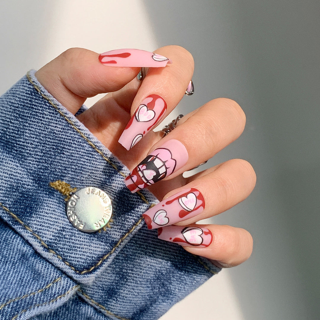 Artificial nail art with heart-shaped design and matte finish Bowlift
