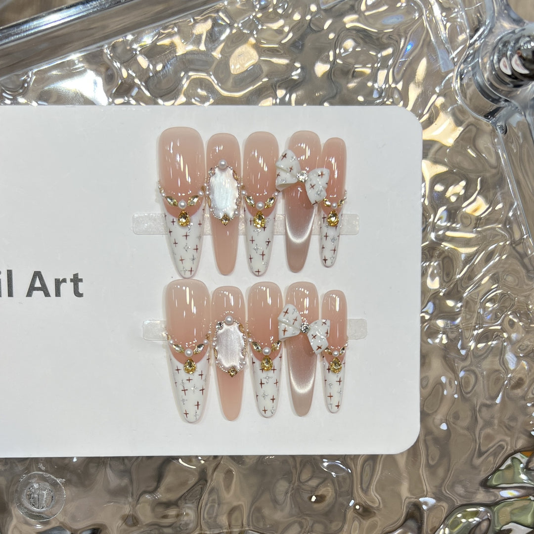 Elegant Stiletto Press-On Nail Set with Decorative Accents Bowlift