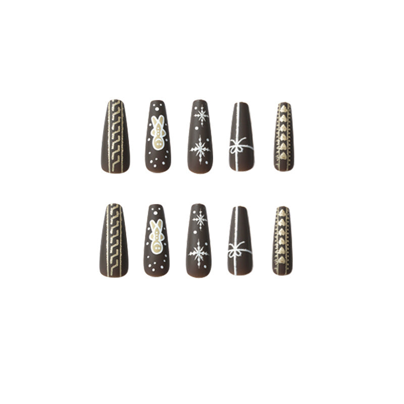 Artificial nail art with festive gingerbread design Bowlift