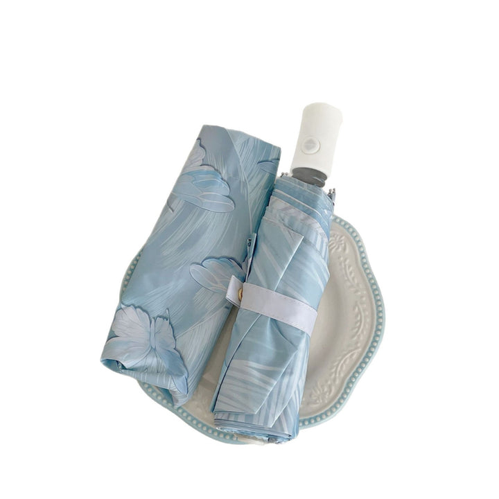 Women Folding Umbrella Bowlift