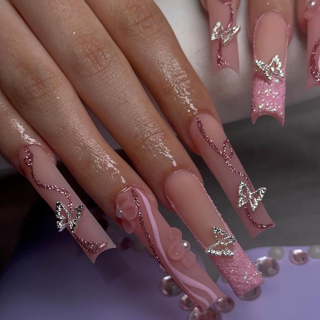 Exquisite Fingernails with Glitter and Decorative Elements Bowlift