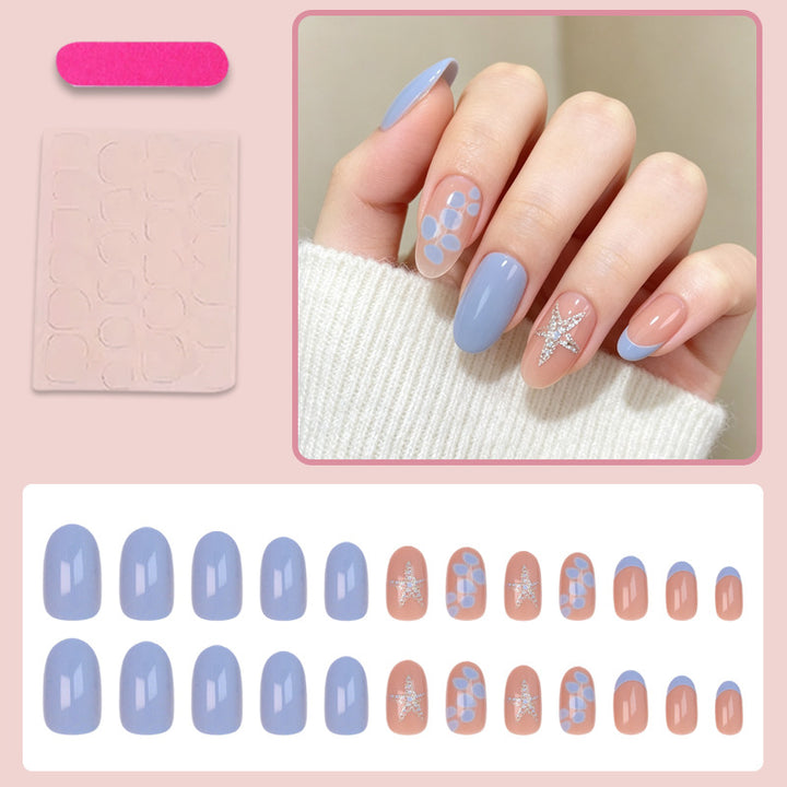 Artificial nail set with elegant patterns and glitter accents Bowlift