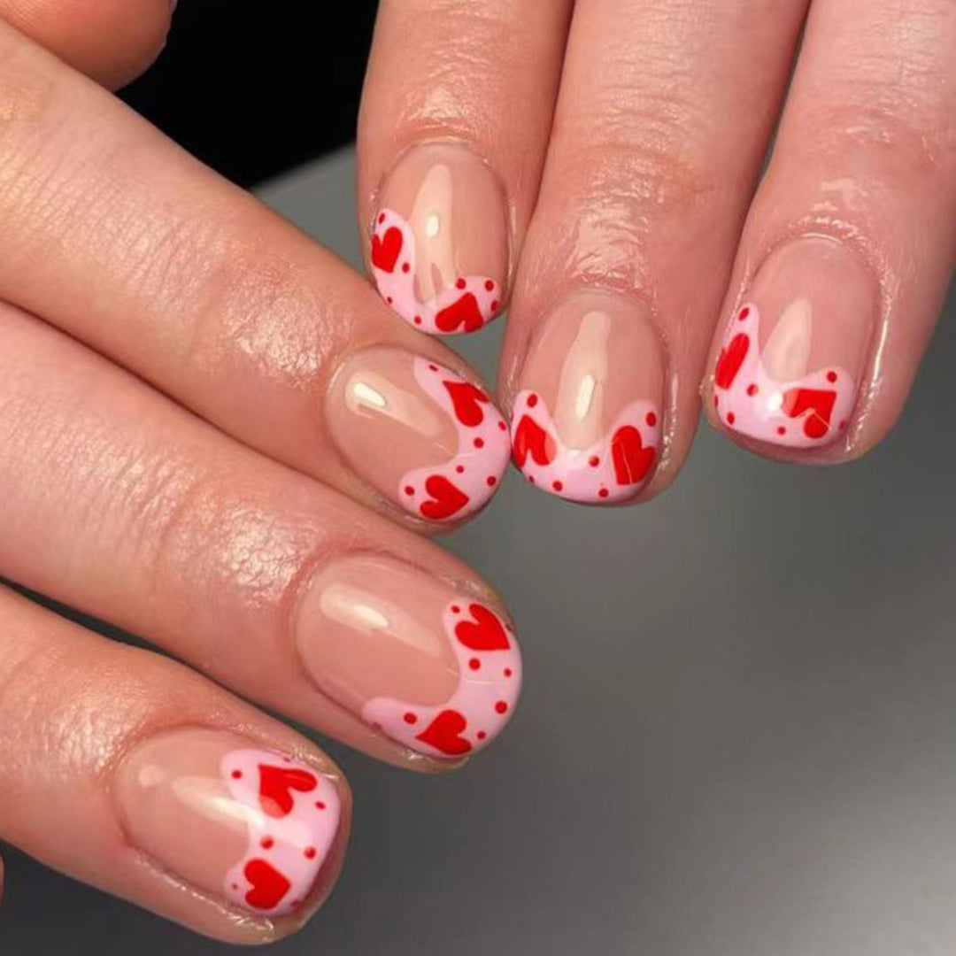 Artfully designed nail tips with heart motifs Bowlift