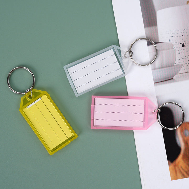 Unisex keychain with reusable label field Bowlift