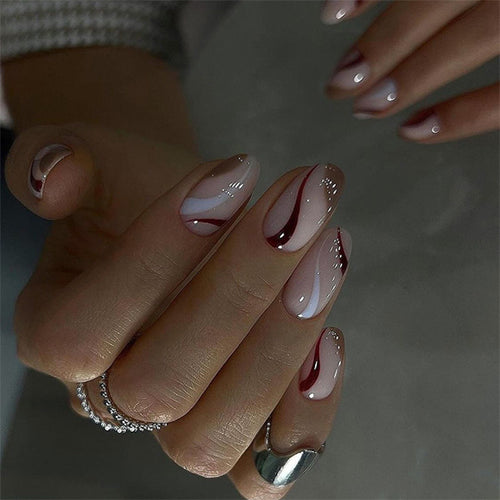 Elegant Nail Art with Modern Wave Pattern and Glitter Accents Bowlift
