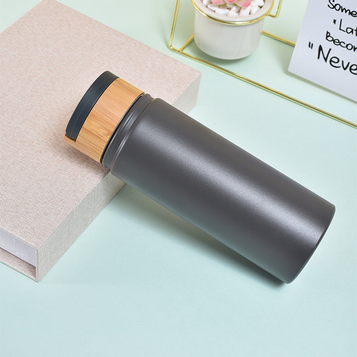Ladies stylish and versatile stainless steel drinking bottle with bamboo lid Bowlift