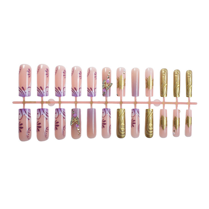 Artificial nail set with delicate flower and glitter accents Bowlift