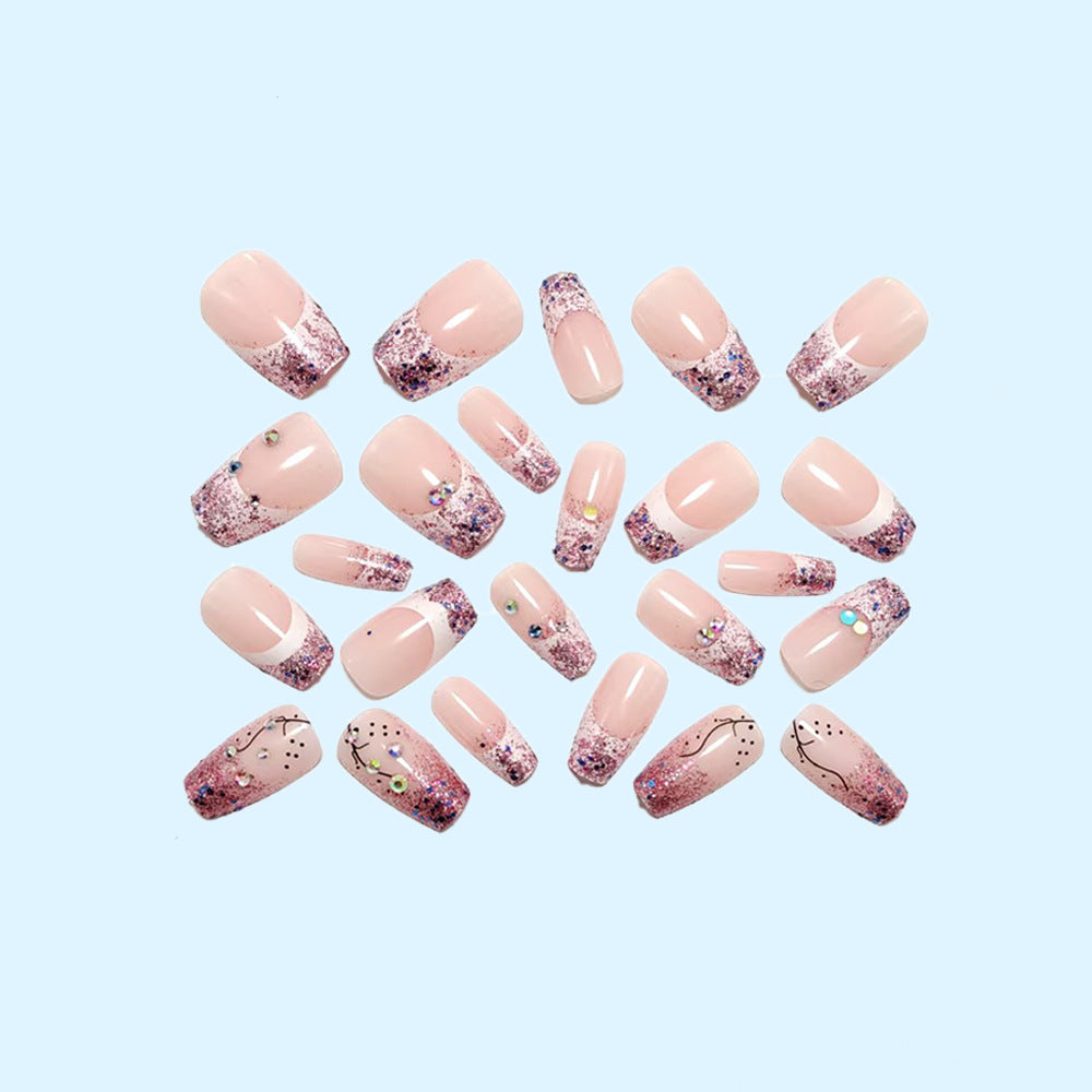 Glittering artificial nails with elegant tip and sparkling accents Bowlift