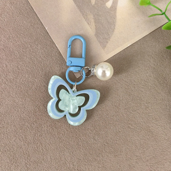 Keychain with butterfly and pearl accent Bowlift