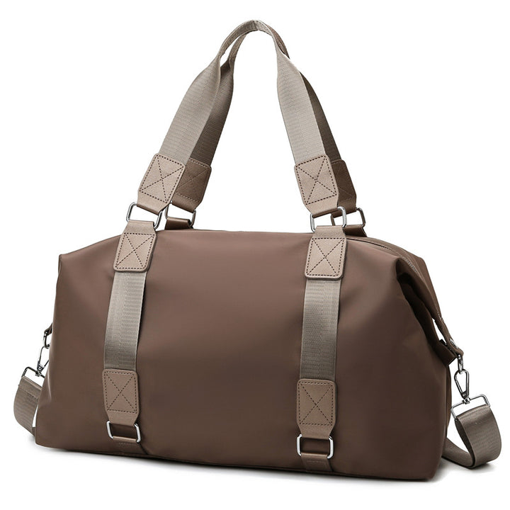 Sports bag with ergonomic carrying handles and versatile interior Bowlift